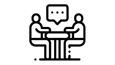 people sat talking at table