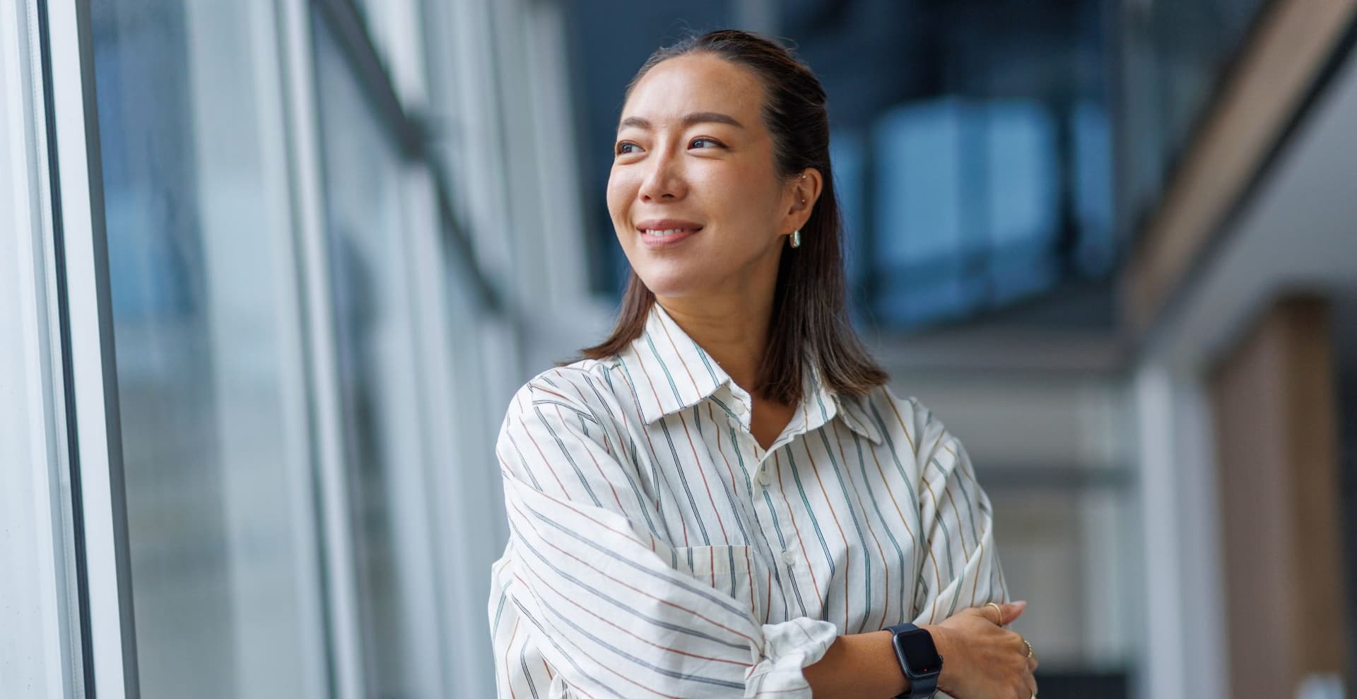 singapore woman standing with arms crossed